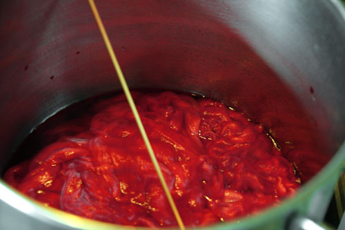 Dyeing the fibre Fibre in the to the cherry dye mix
