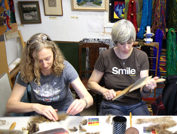 Helen and Juliet carding and prepading fleece for spinning Helen and Juliet carding and prepading yarn